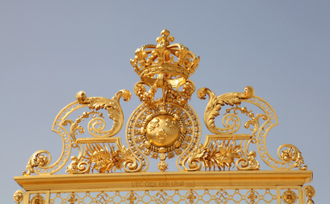 gate with golden crown at Versailles