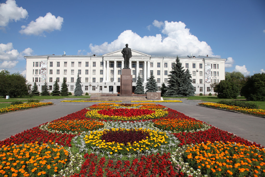 University of Pskov the flowerbeds of July in Russia and Lenin lousing up the picture