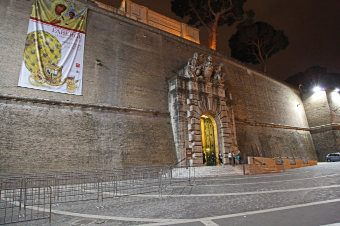 Grand entrance now an exit to Vatican Museums through great big thick wall